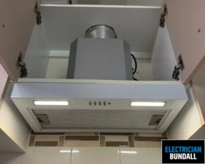 Close-up of a ceiling vent with air conditioning and lighting system.